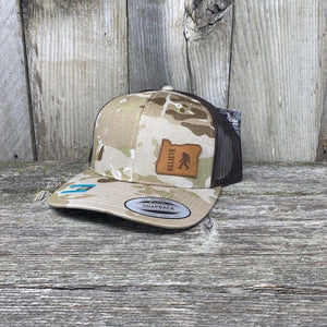BIGFOOT OREGON LEATHER PATCH HAT FLEXFIT Leather Patch Hats Hells Canyon Designs Arid/Brown Multicam