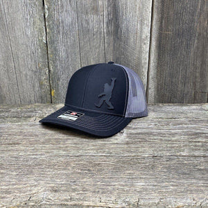 BIGFOOT SHAKA BLACK LEATHER PATCH HAT - RICHARDSON 112 Leather Patch Hats Hells Canyon Designs # Black/Charcoal 