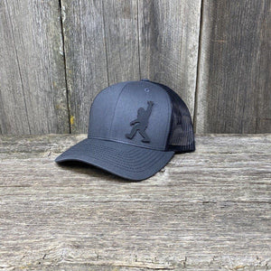 BIGFOOT SHAKA BLACK LEATHER PATCH HAT - RICHARDSON 112 Leather Patch Hats Hells Canyon Designs # Charcoal/Black