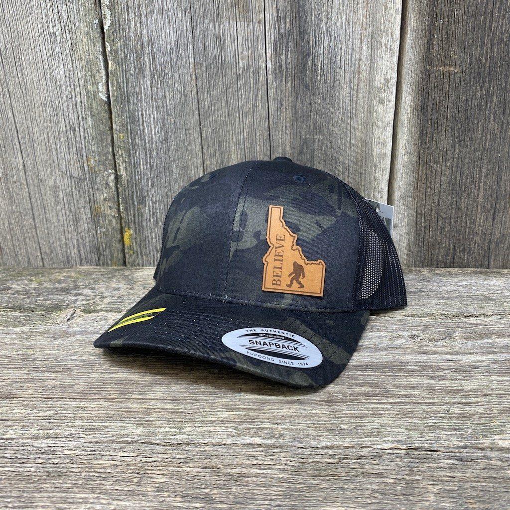SASQUATCH IDAHO LEATHER PATCH HAT FLEXFIT Leather Patch Hats Hells Canyon Designs # Black Multi-cam