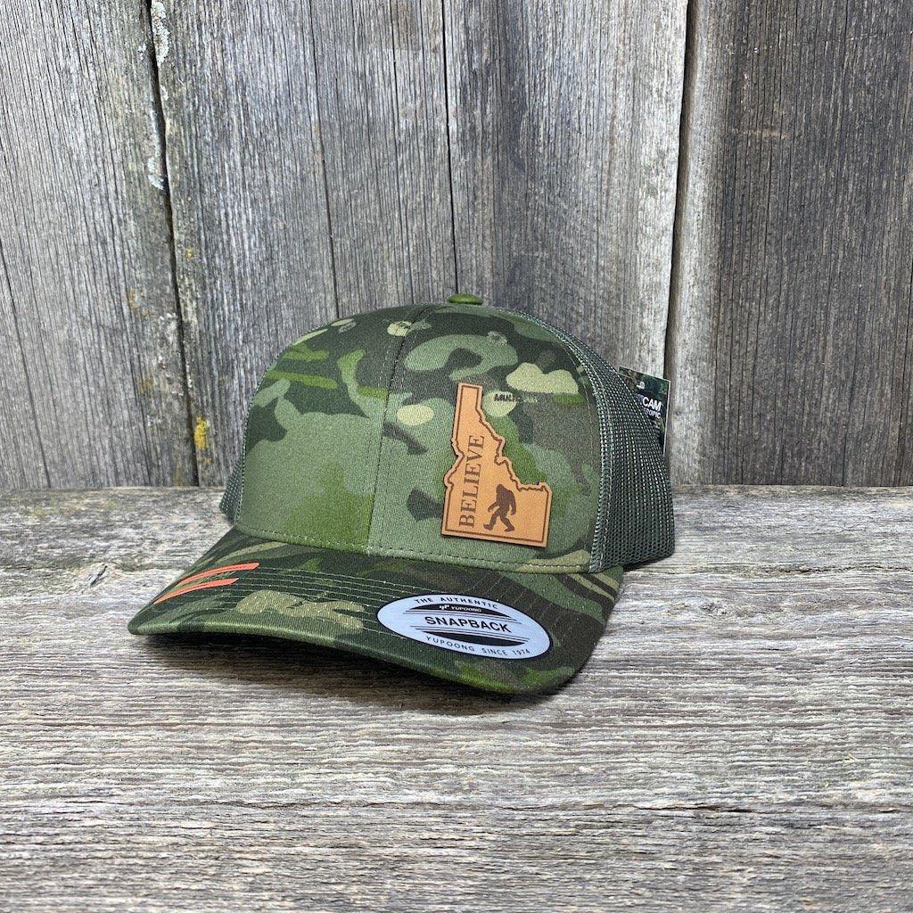 SASQUATCH IDAHO LEATHER PATCH HAT FLEXFIT Leather Patch Hats Hells Canyon Designs # Tropical Multi-cam
