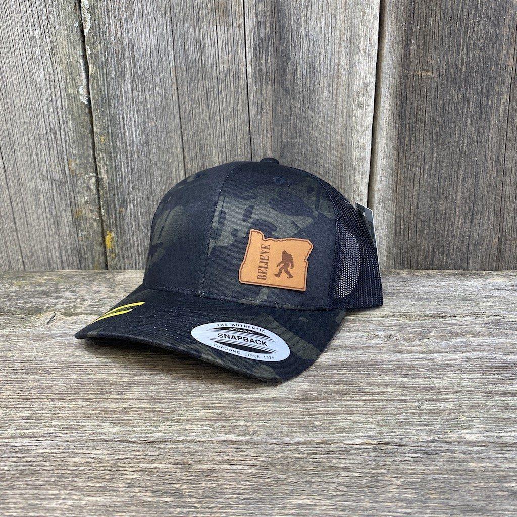 SASQUATCH OREGON LEATHER PATCH HAT FLEXFIT Leather Patch Hats Hells Canyon Designs Black Multicam