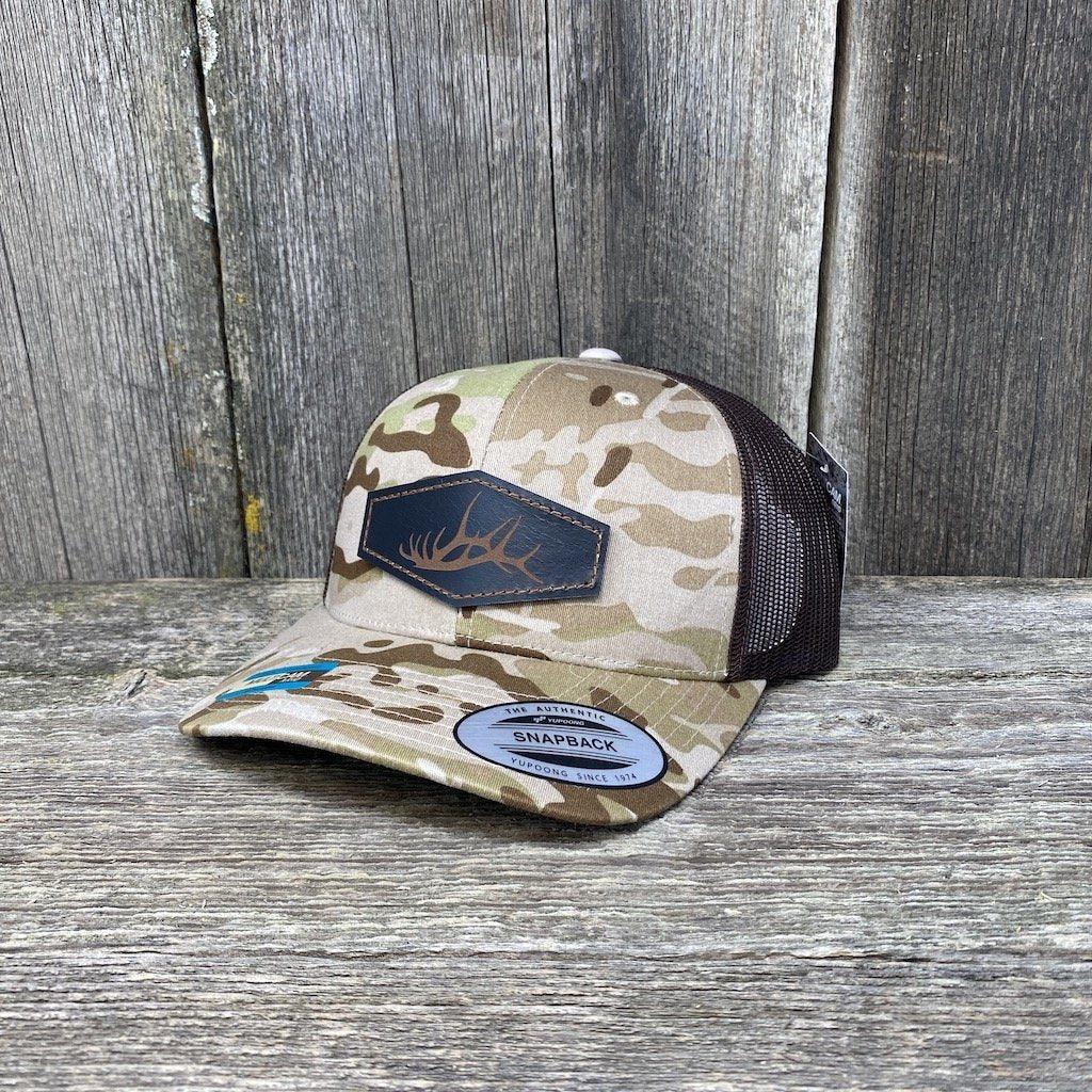 HAND SEWN BLACK ELK SHED LEATHER PATCH HAT - FLEXFIT SNAPBACK Leather Patch Hats Hells Canyon Designs  # Arid Tan/Brown Multi-cam