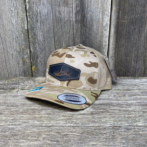 HAND SEWN BLACK ELK SHED LEATHER PATCH HAT - FLEXFIT SNAPBACK Leather Patch Hats Hells Canyon Designs # Arid/Tan Multicam 