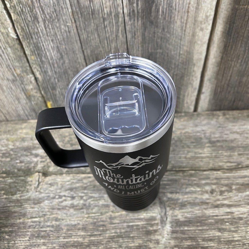 https://www.hellscanyondesigns.com/cdn/shop/products/mountains-are-calling-20oz-coffee-cup-tumbler-hells-canyon-designs-595317_1200x.jpg?v=1618887310