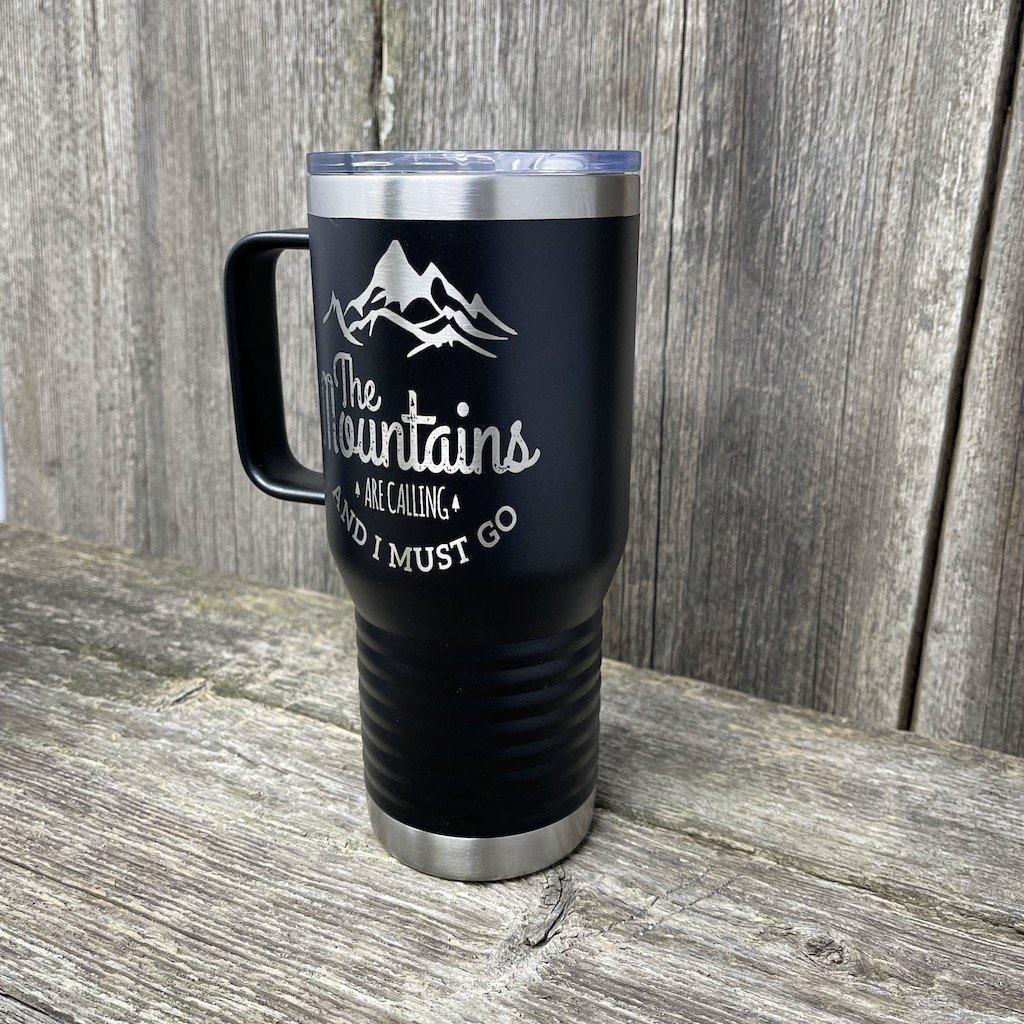 https://www.hellscanyondesigns.com/cdn/shop/products/mountains-are-calling-20oz-coffee-cup-tumbler-hells-canyon-designs-716022_1200x.jpg?v=1618887305