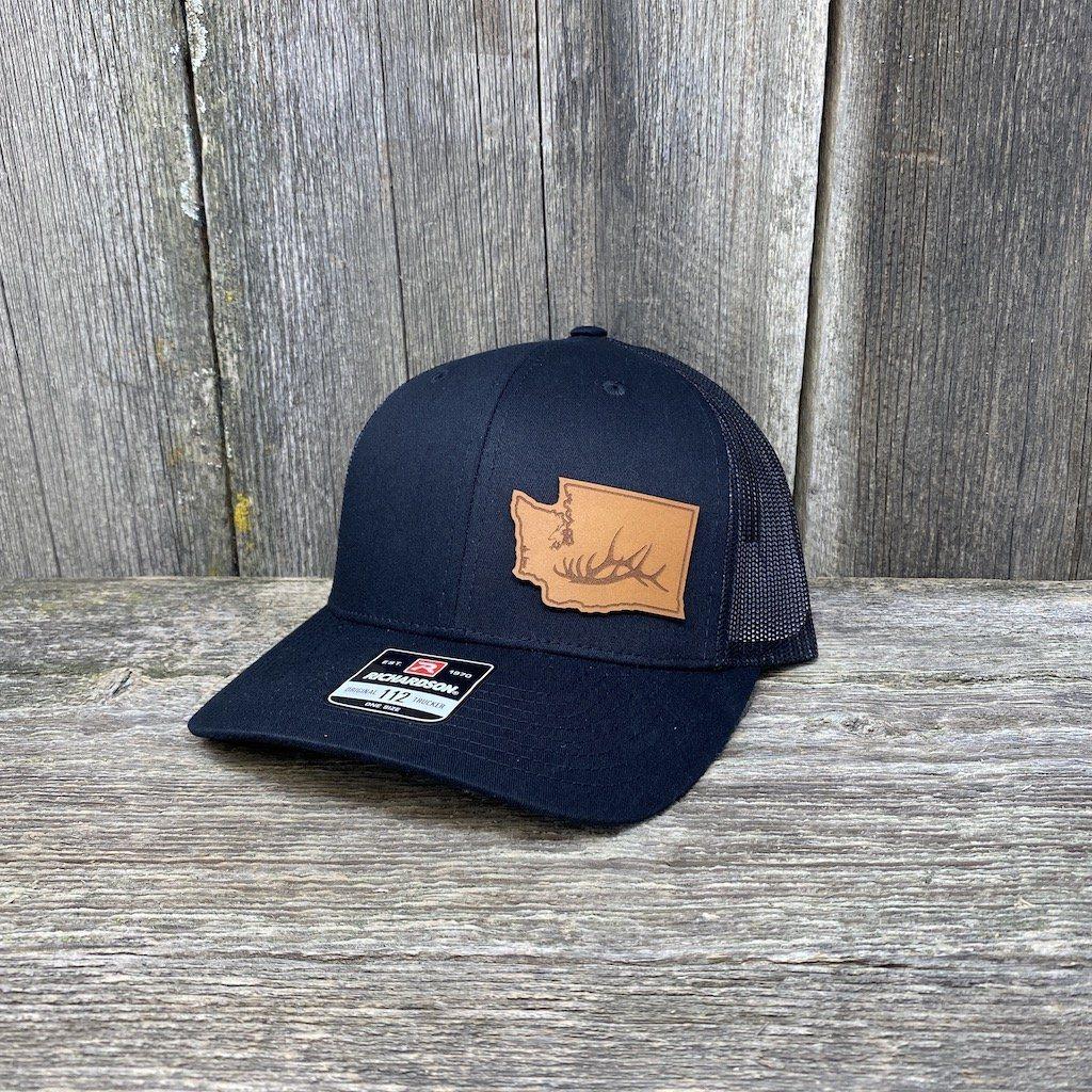 https://www.hellscanyondesigns.com/cdn/shop/products/washington-elk-patch-hat-richardson-112-leather-patch-hats-hells-canyon-designs-solid-black-936507.jpg?v=1620374303